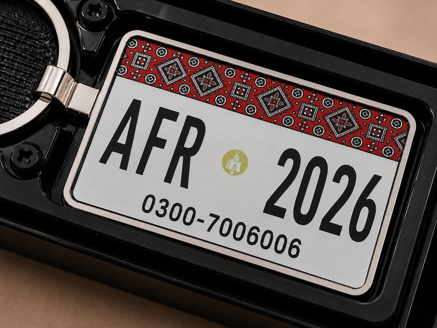 Descriptive Image of Sindh Ajrak Car Number Plate Keychain – Double-Sided | Metal