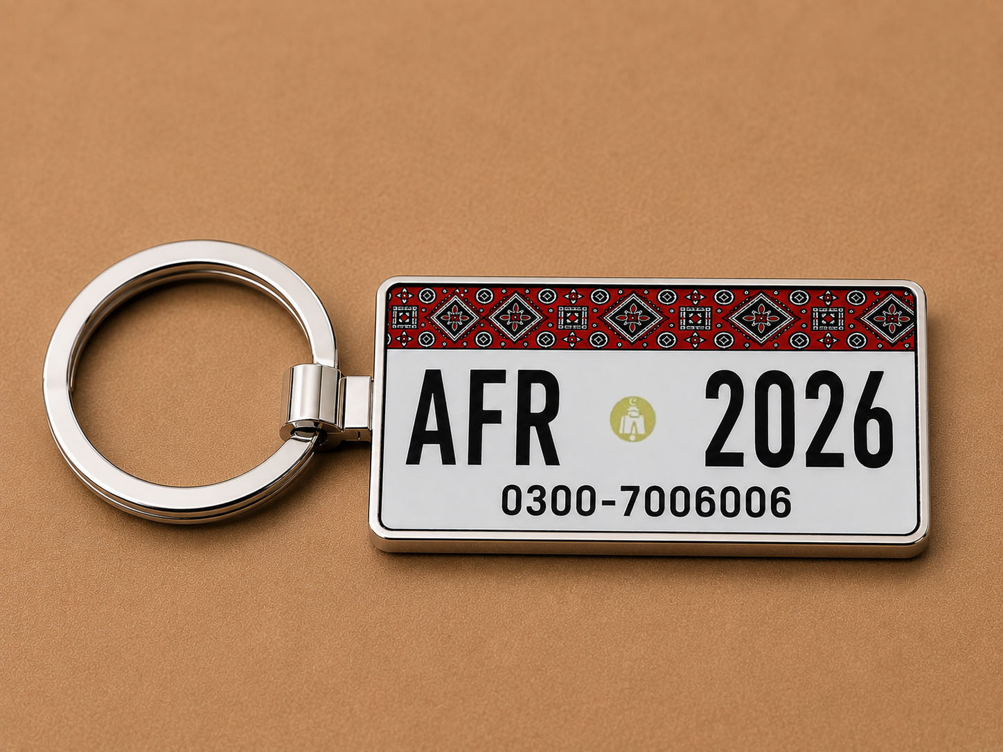 Descriptive Image of Sindh Ajrak Car Number Plate Keychain – Double-Sided | Metal